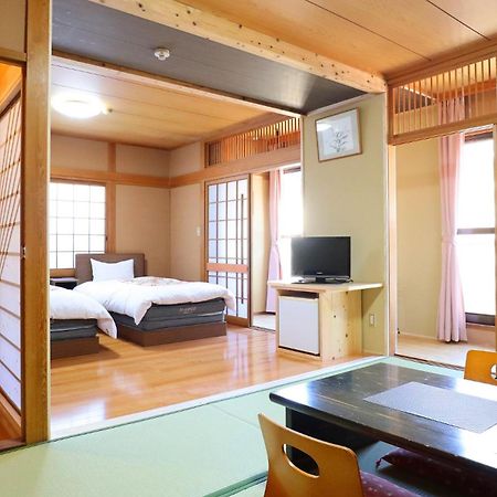 Ban-Ya Hot Spring Inn Юфу Экстерьер фото